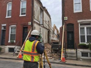 Construction survey monitoring adjacent rowhouses during selective demolition in Baltimore Maryland
