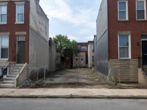 Property Survey of a vacant lot between brick buildings in Baltimore Maryland for boundary and redevelopment planning